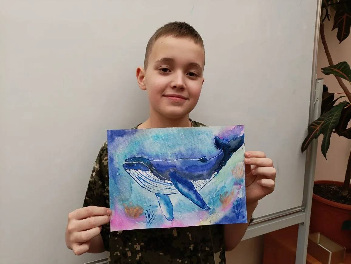 Участник занятия со своей работой